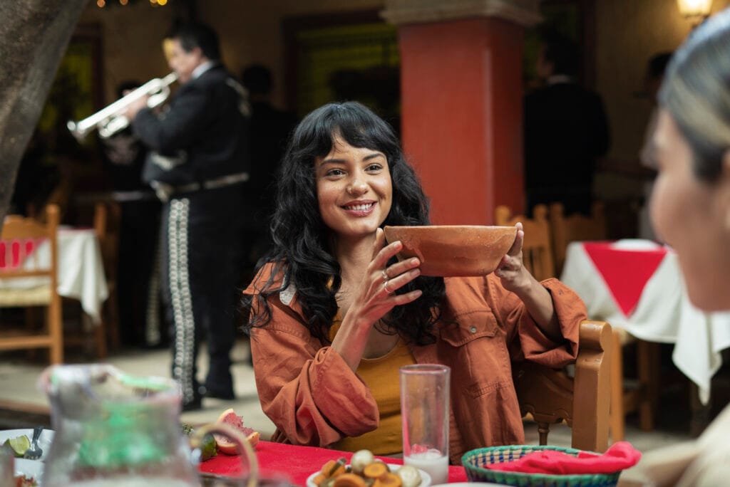 About adults enjoying mexican food